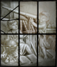 17th-18th century sepia stained glass window with astronomical putti scene.