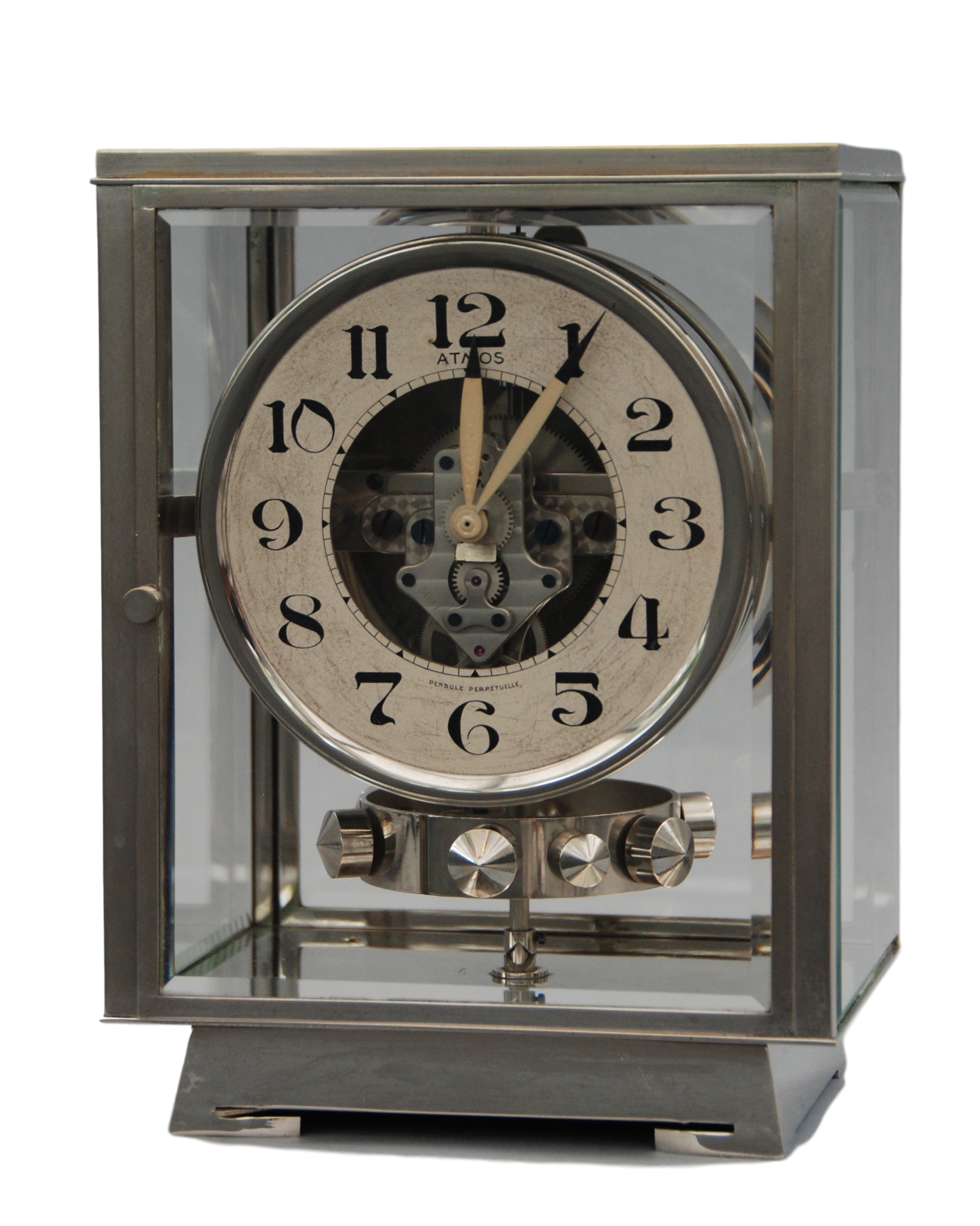 An early 1930's Rhodium plated art deco J. L. Reutter four-glass clock
