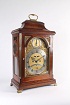 A rare German mahogany table clock of 8-day duration by Peter Behrens Schleswig, last quarter 18th Century.