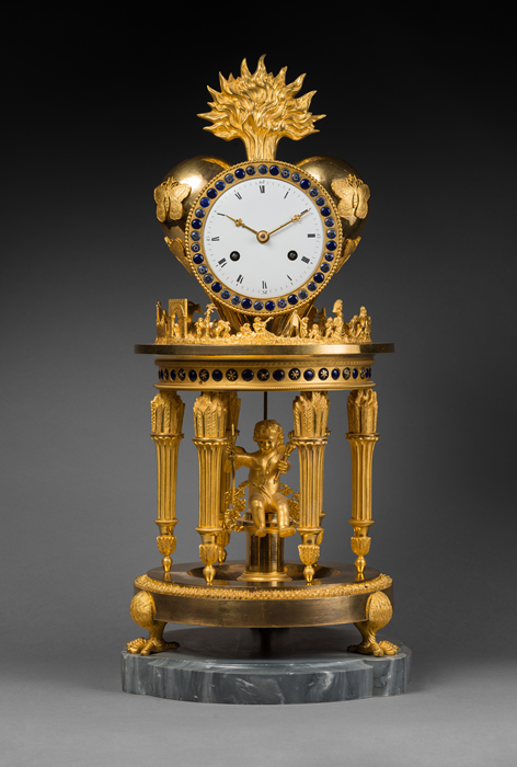 Case Attributed to Jean-Simon Deverberie (1764 - 1824)
Rare Chased and Gilt Bronze Mantel Clock 
“The Temple of Love”  
Paris, Directoire period, circa 1795 
Height 51 cm; diameter 23 cm