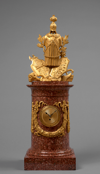 Important Gilt Bronze and Swedish Porphyry War Trophy Mantel Clock 
Sweden, Empire period, first third of the 19th century, circa 1815-1820
Height 56 cm; base 17.5 cm x 17.5 cm