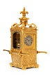 A rare and amusing French gilt brass 'sedan' carriage clock, circa 1870