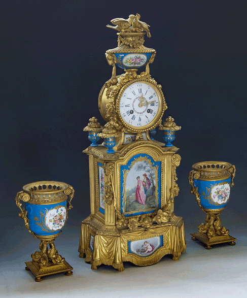 Garniture de Cheminée. A fine antique and very decorative clock by the esteemed parisian Edouard Kreisser gallery c. 1850.