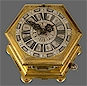 An antique Renaissance hexagonal horizontal gilt brass table clock.