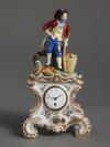 A charming small KPM porcelain pendulette, circa 1850