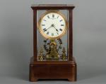 Eureka Clock Co Ltd., a battery powered mahogany mantel clock, circa 1908