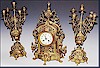An elegant French late 19th century bronze clock garniture. €. 900,-